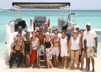 The Biorock volunteer team, members of the DECR and staff from Oasis Divers