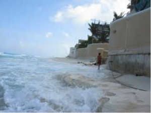 Figure 5. Cancun seawalls cause beach erosion, causing endless cycles of sand dumping, all of which washes away again (Google images)
